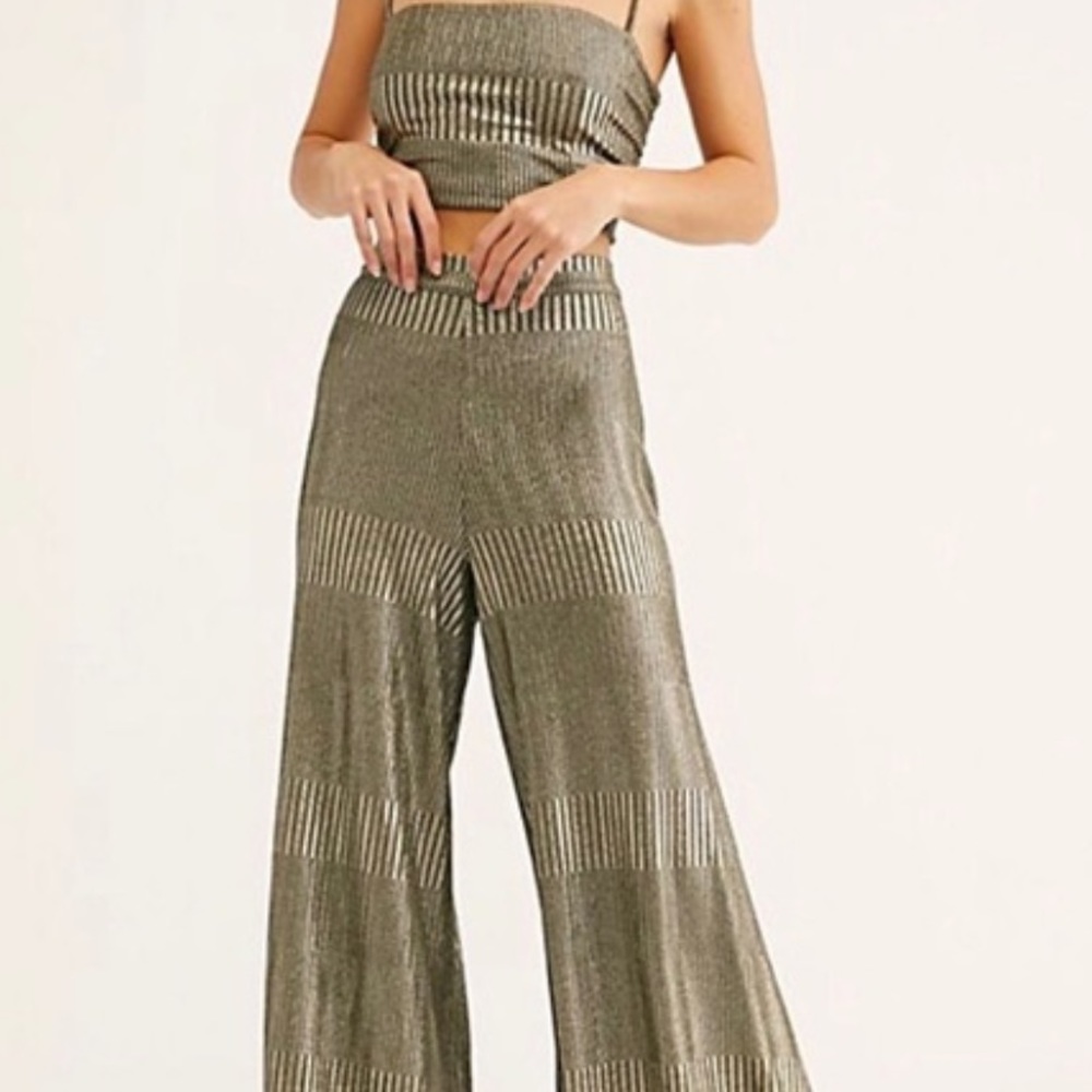 FREE PEOPLE Shiny strappy set. Retro inspired ribbed set in a statement metallic